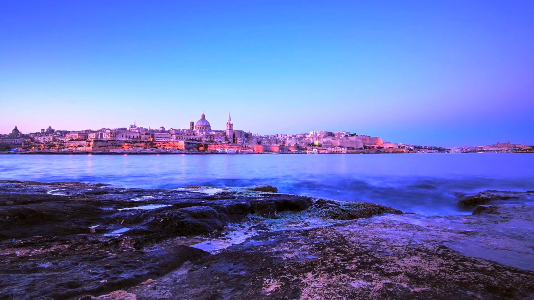 Sunset-photo-of-city-of-Valletta-from-the-shore-Malta